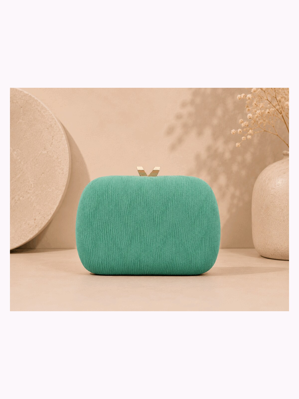 Clutch Esmeralda Capri.