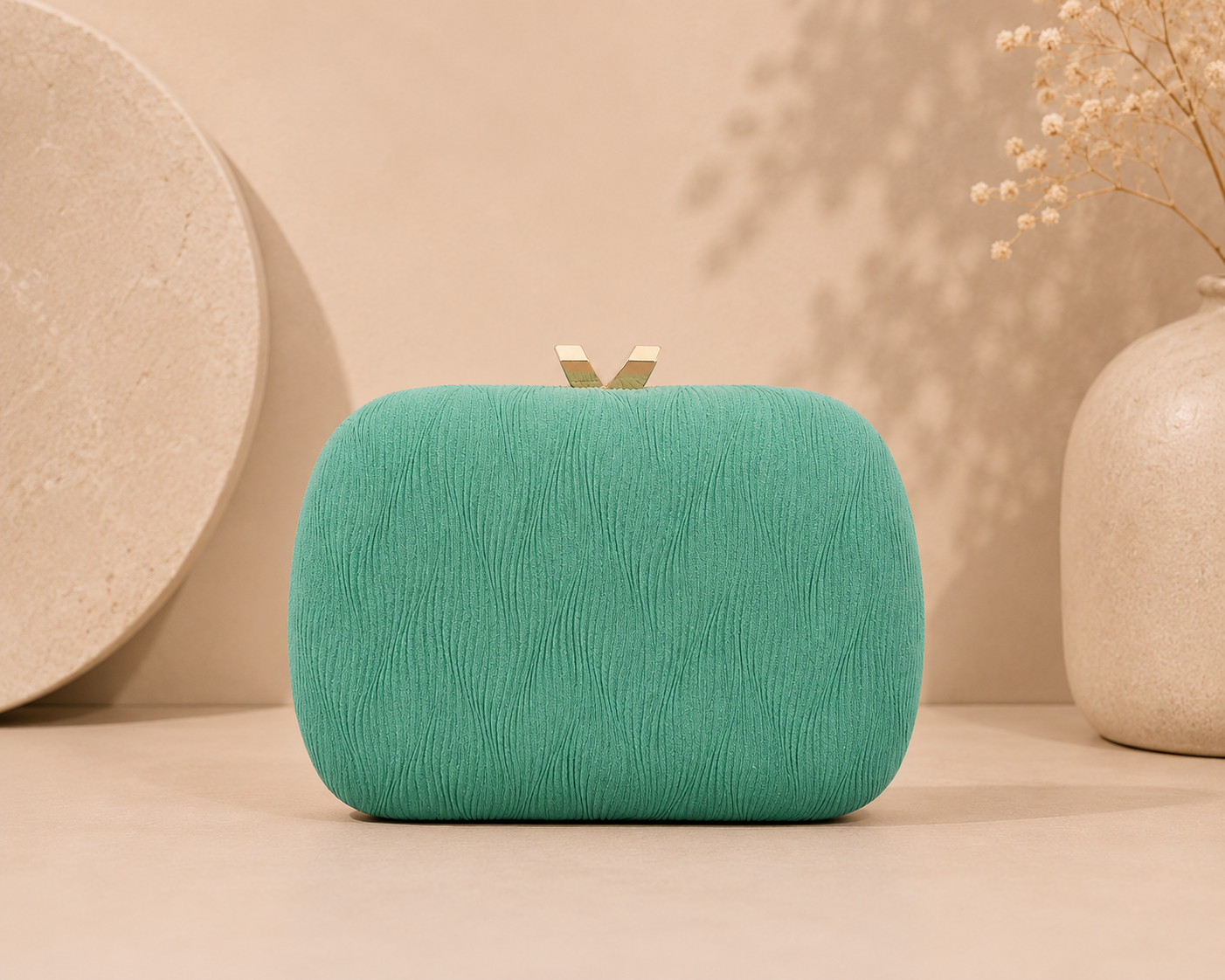 Clutch Esmeralda Capri.