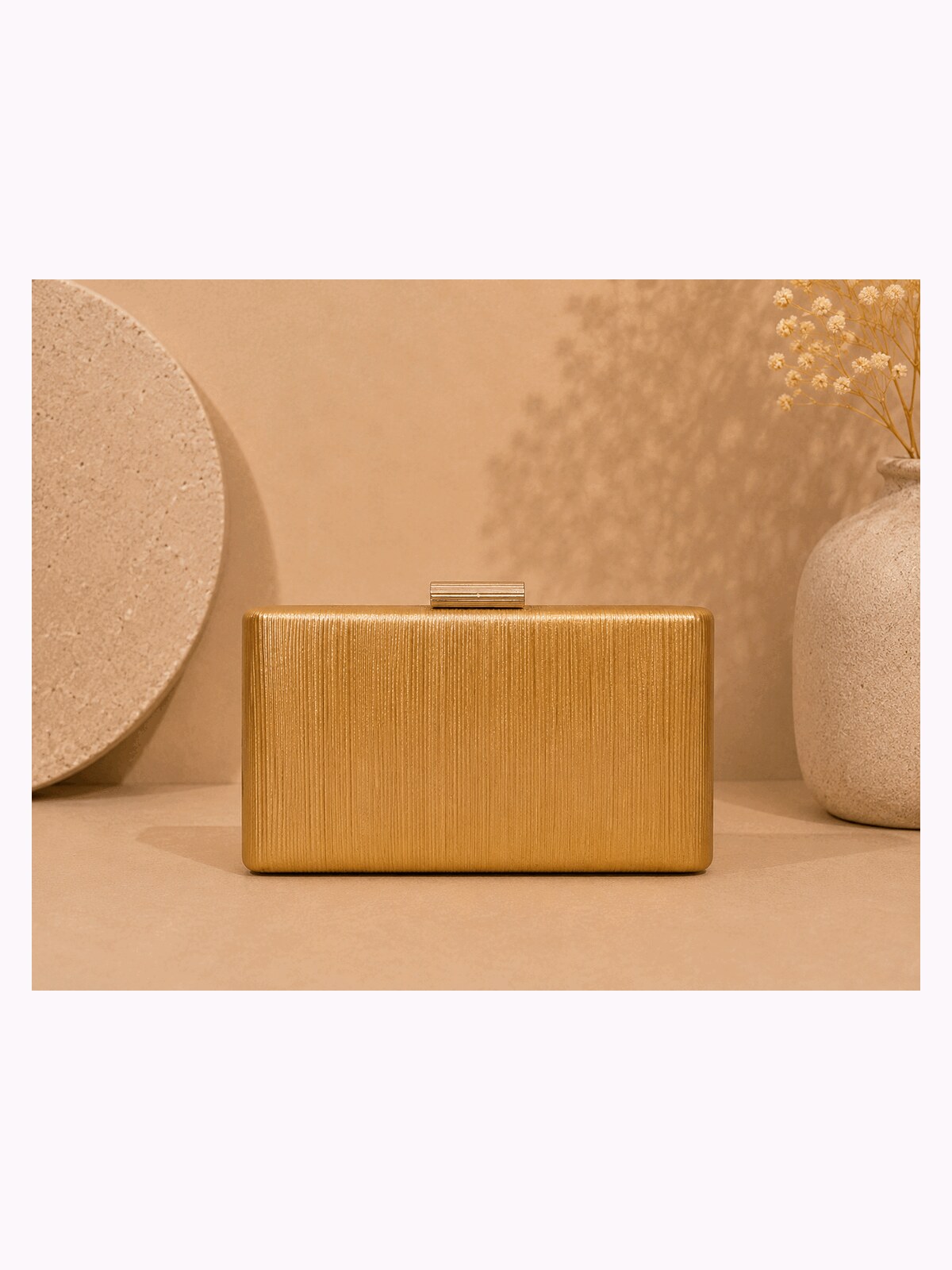 Clutch Sol de Oro.