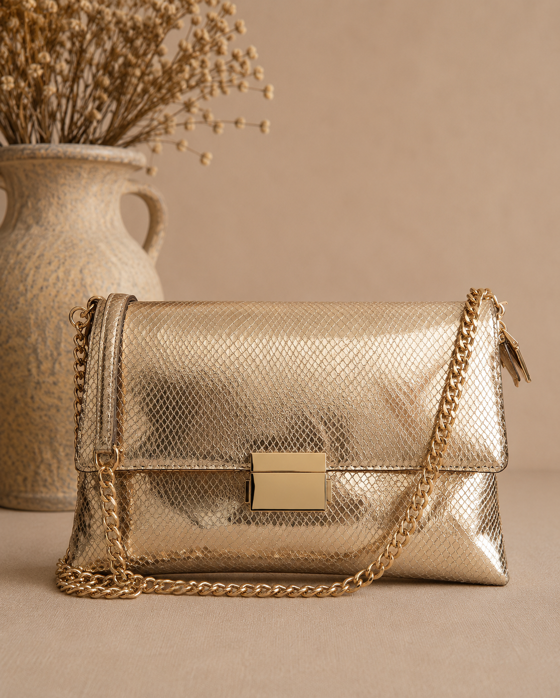 Clutch Royale. Oro Champán.